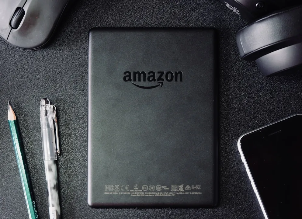 An e-commerce manager analyzing Amazon search engine keywords on a digital dashboard to optimize product listings for higher conversions.